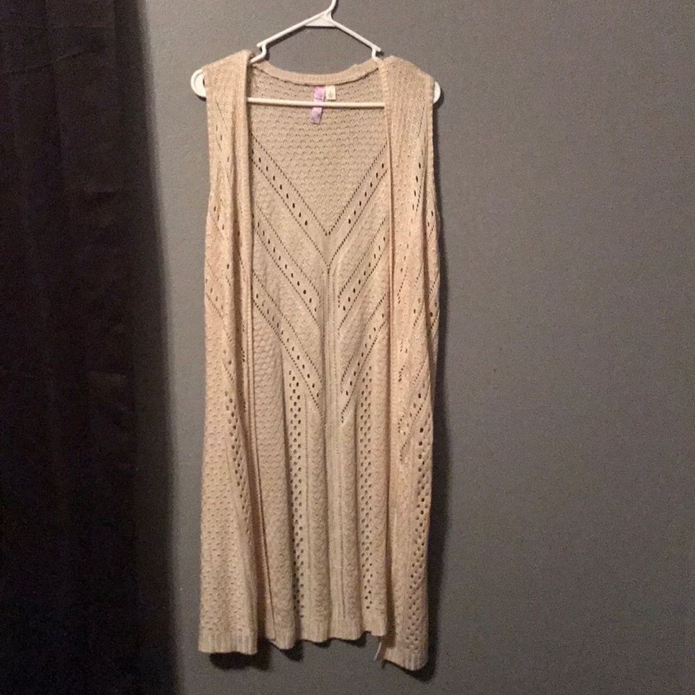 Long sleeveless overlay